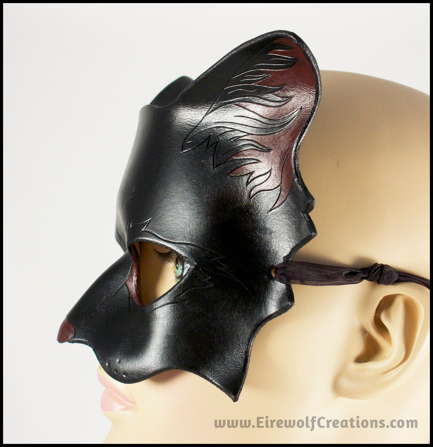 A handmade black cat leather masquerade mask with dark red nose and inner ears. By Erin Metcalf of Eirewolf Creations.