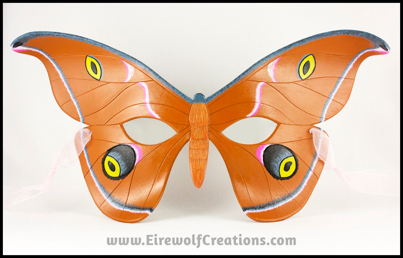 Handmade leather moth mask for a masquerade costume, handpainted to resemble the Antheraea Polyphemus moth. By Erin Metcalf of Eirewolf Creations.