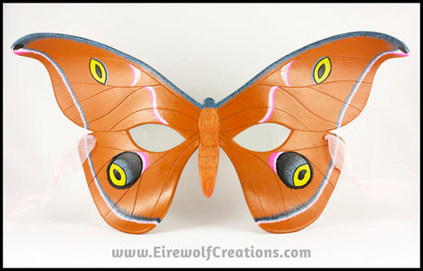 Handmade leather moth mask for a masquerade costume, handpainted to resemble the Antheraea Polyphemus moth. By Erin Metcalf of Eirewolf Creations.