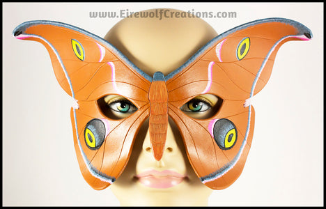 Handmade leather moth mask for a masquerade costume, handpainted to resemble the Antheraea Polyphemus moth. By Erin Metcalf of Eirewolf Creations.